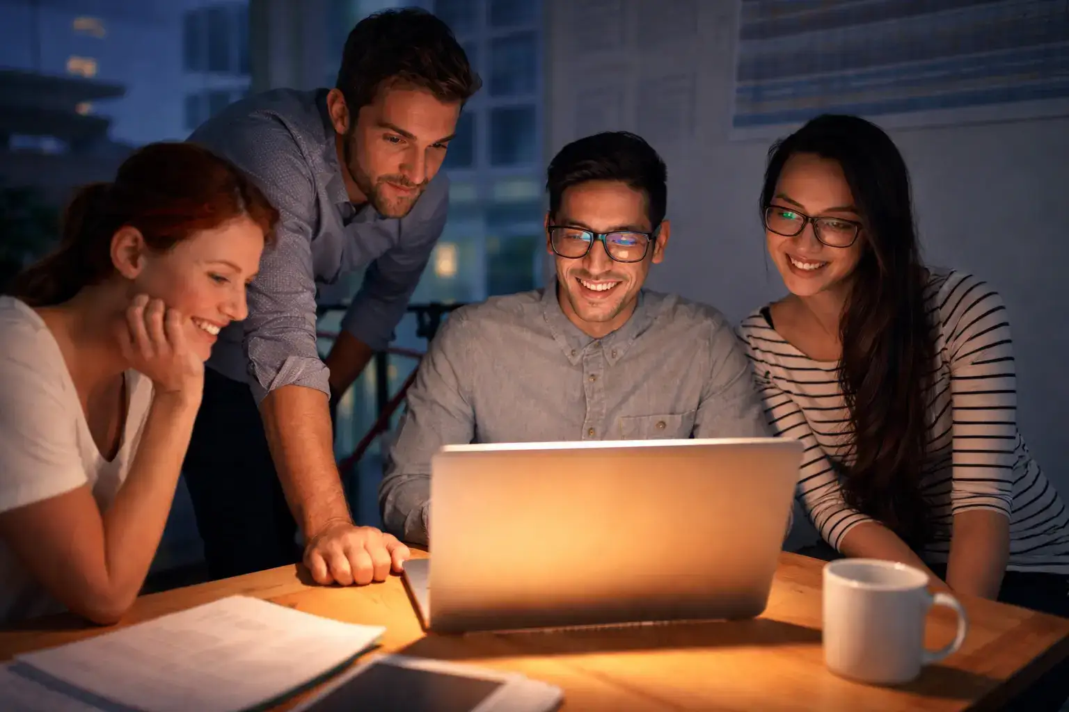 Cubecodex professionals collaborating in a modern workspace